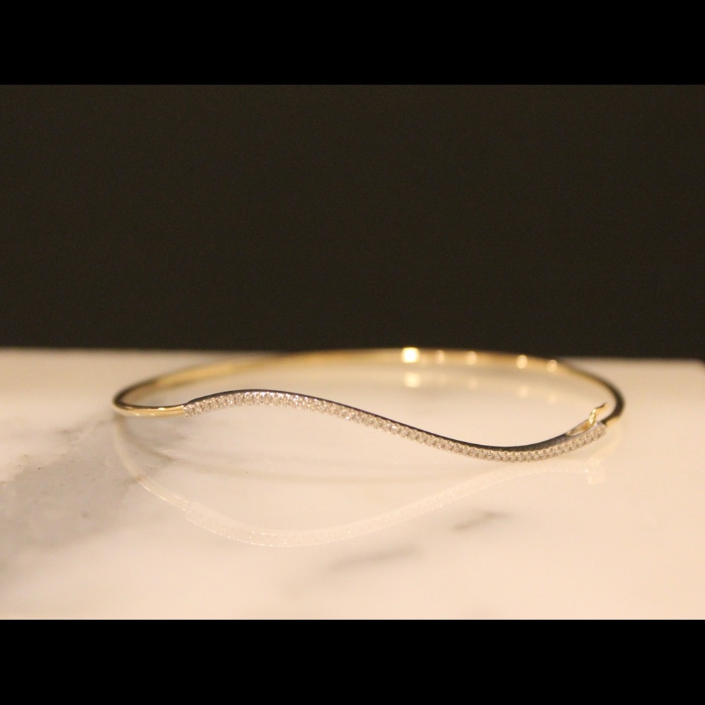 14k two tone white/yellow 0.40 ct diamond bangle.